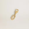 Letter O charm in gold-colored brass with crystals