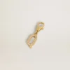Letter Q charm in gold-colored brass with crystals