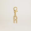 Letter R charm in gold-colored brass with crystals