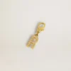 Letter R charm in gold-colored brass with crystals