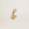 Letter W charm in gold-colored brass with crystals