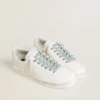 Light-blue cotton laces with contrasting gold-colored logo