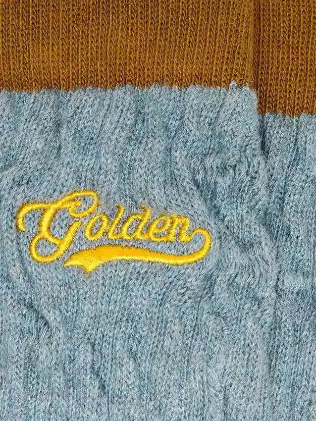 Light blue ribbed socks with brown details and yellow logo