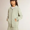 Light green sweatshirt with zip fastening
