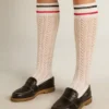 Long ribbed socks in vintage white with two-tone stripes