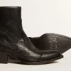 Low Debbie boots in black snake-print leather