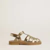 Maxime Young sandals in gold leather