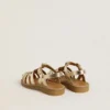 Maxime Young sandals in gold leather