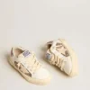 May Teen in white leather and rose gold glitter with beige suede star