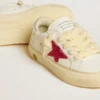 May Young with fuchsia glitter star and metallic leather heel tab
