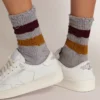 Melange grey socks with distressed details and two-tone stripes
