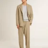 Men's beige pinstripe single-breasted jacket with an oversized fit