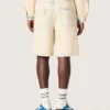 Men's Bermuda shorts in light sand-colored denim