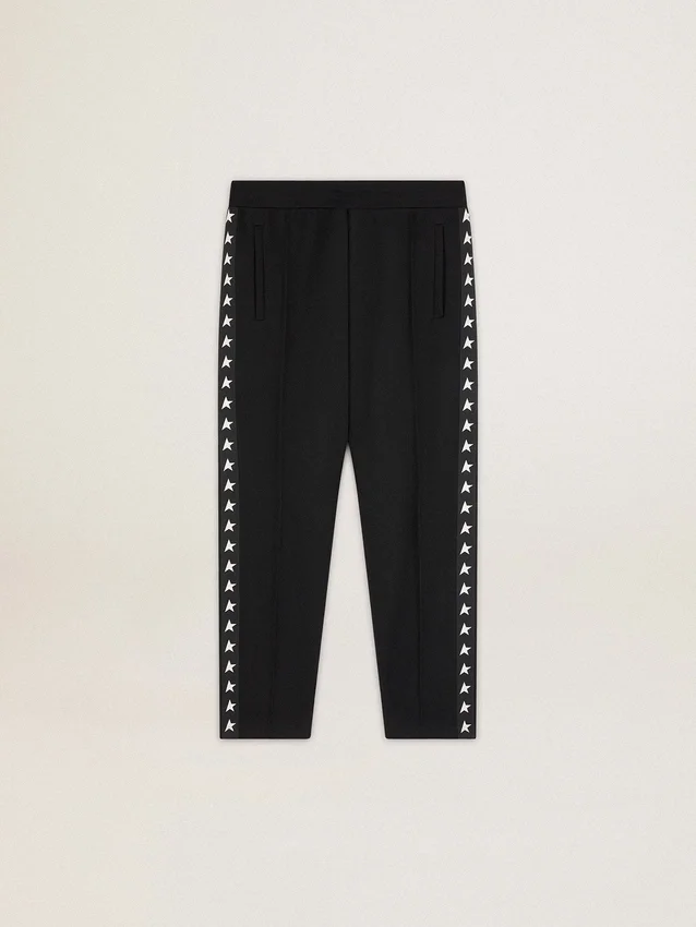 Men's black joggers with white stars on the sides