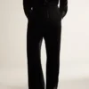 Men's black velvet effect pants