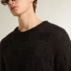 Men's black wool sweater with a distressed effect