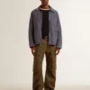 Men's blue jacket in denim cotton with distressed treatment