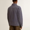 Men's blue jacket in denim cotton with distressed treatment