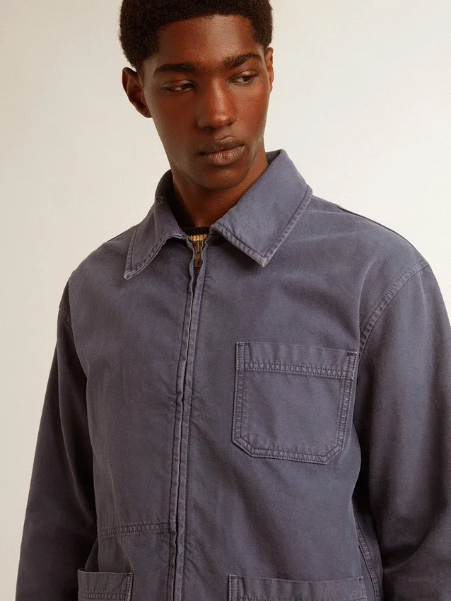 Men's blue jacket in denim cotton with distressed treatment