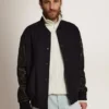 Men's bomber jacket in dark blue wool with leather sleeves