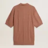 Men's brick-colored polo with embroidered logo.