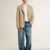 Men's denim chinos with distressed details