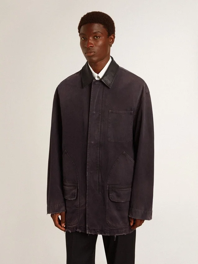 Men's denim jacket with distressed details and leather collar