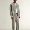 Men's gray denim jacket with studs