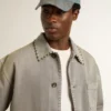 Men's gray denim jacket with studs