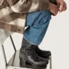 Men's high Biker boots in black leather with strap and silver-colored buckle