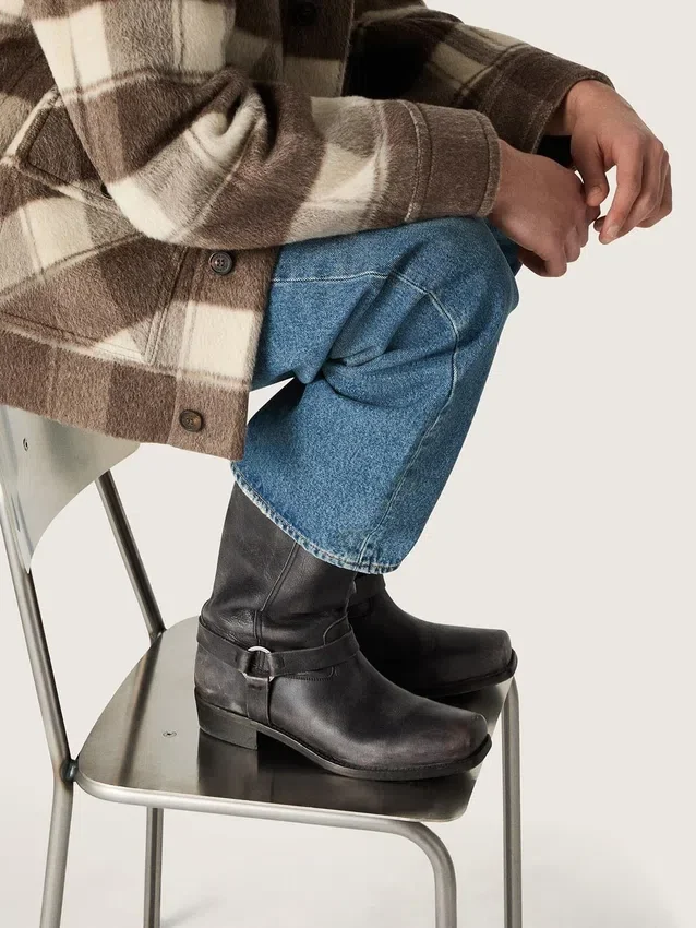 Men's high Biker boots in black leather with strap and silver-colored buckle