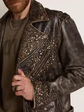 Men’s leather biker jacket with hammered studs and adhesive tape