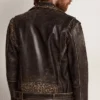 Men's leather biker jacket with hammered studs and adhesive tape
