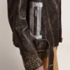 Men's leather biker jacket with hammered studs and adhesive tape