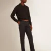 Men’s long-sleeved polo shirt in black merino wool