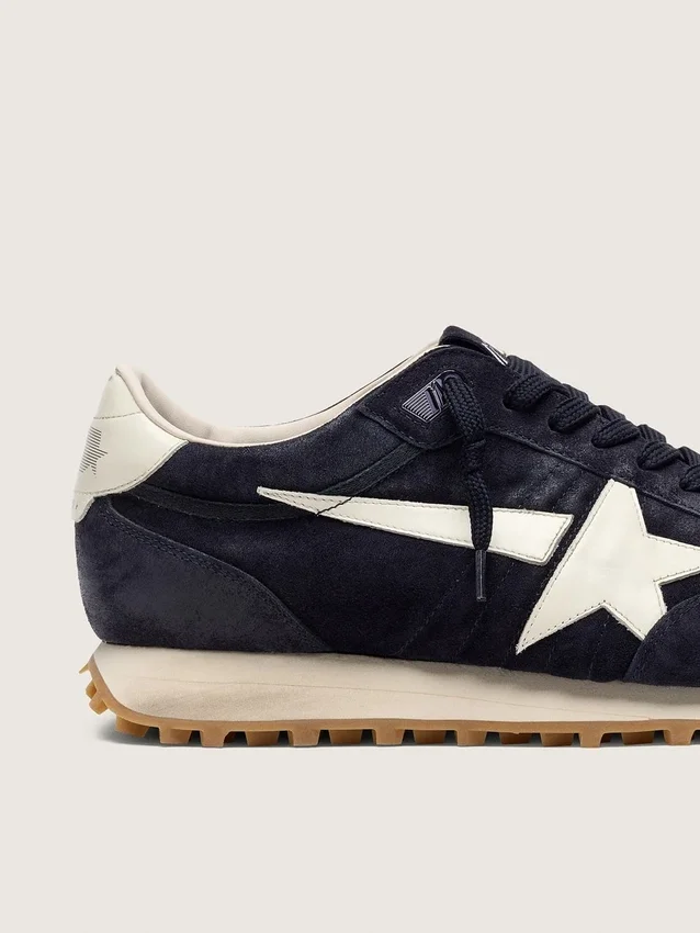 Men’s Marathon in blue navy suede with white leather star and heel tab