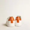Men's Purestar with white leather star and orange heel tab