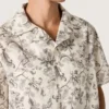 Men's short-sleeved cotton shirt with black and white floral print