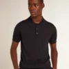 Men’s short-sleeved polo shirt in navy-blue merino wool