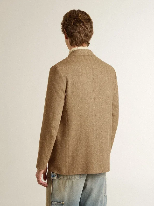 Men's single-breasted blazer in a sand-colored chevron linen blend.