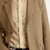 Men's single-breasted blazer in a sand-colored chevron linen blend.