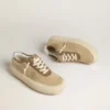 Men's Space-Star in beige suede with perforated star and metallic silver heel tab