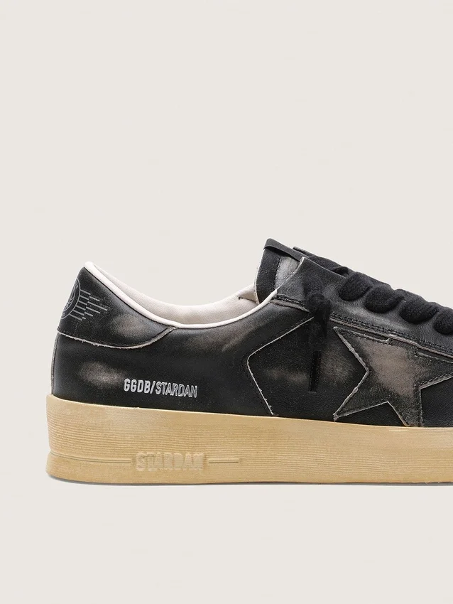 Men's Stardan in black leather with black leather star and heel tab