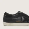 Men's Super-Star in black nappa with black suede star and heel tab