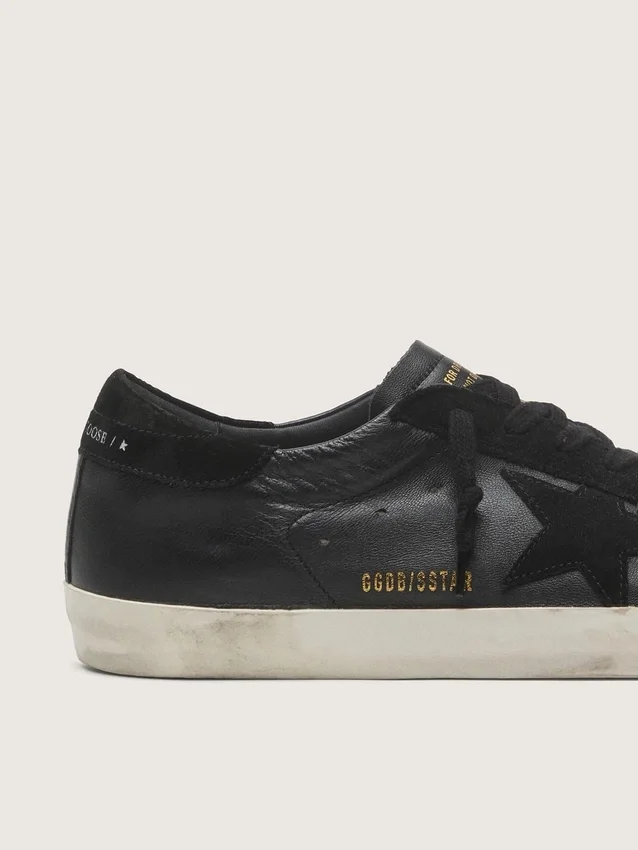 Men's Super-Star in black nappa with black suede star and heel tab