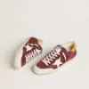 Men’s Super-Star in brick-red suede with white leather star and animal-print heel tab