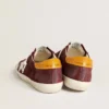 Men’s Super-Star in brick-red suede with white leather star and animal-print heel tab