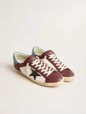 Men’s Super-Star in crackle leather with brown star and teal heel tab