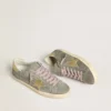 Men's Super-Star in gray suede with gold metallic leather star and heel tab
