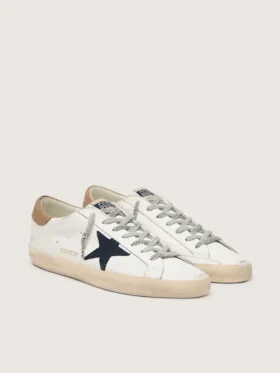 Men’s Super-Star in white leather with midnight-blue canvas star and tobacco leather heel tab
